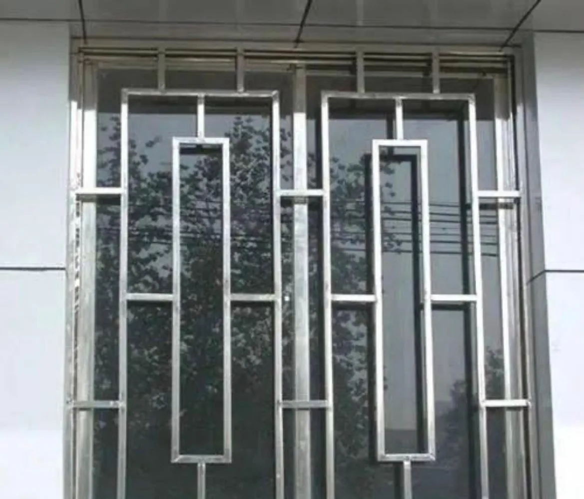 Window grill with geometric stainless steel pattern