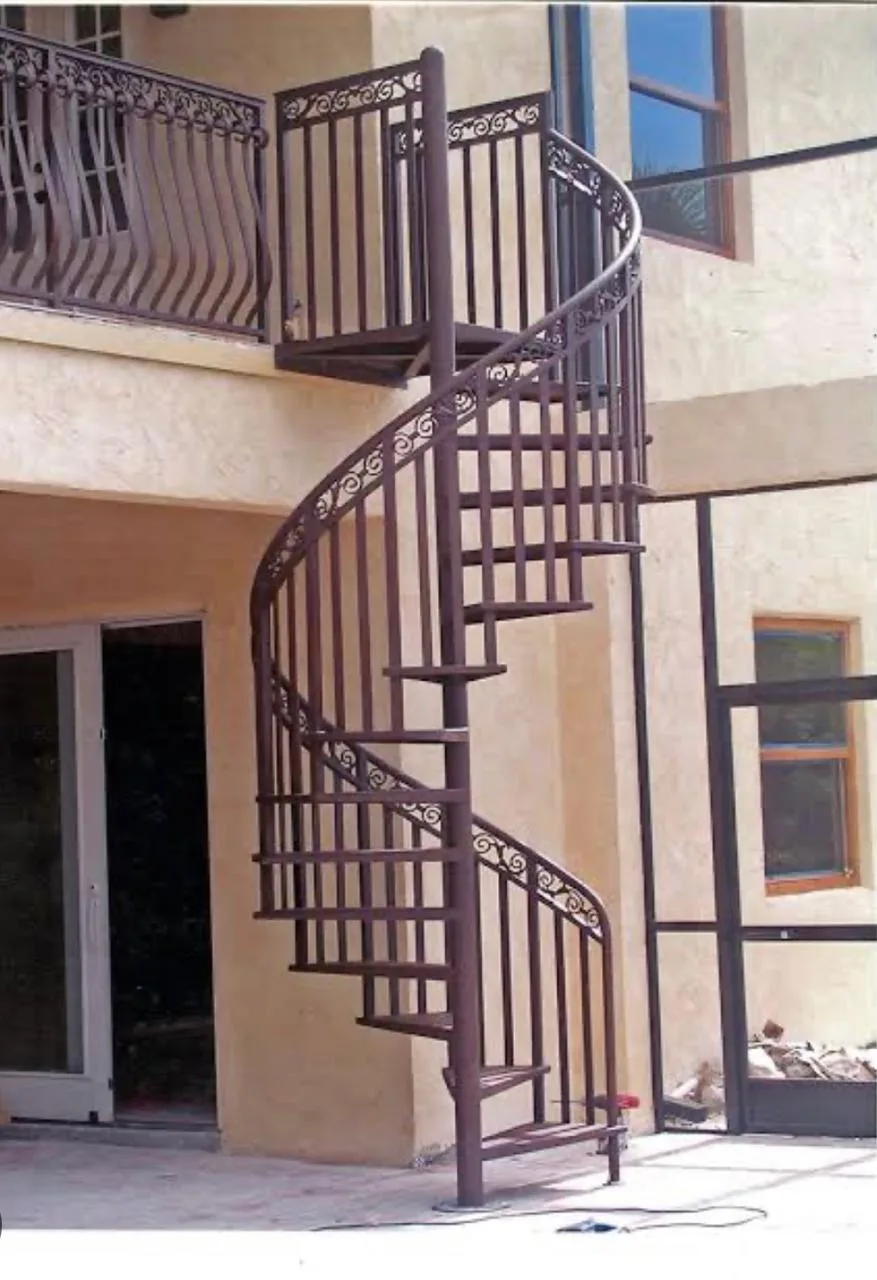 Spiral staircase with ornamental balusters