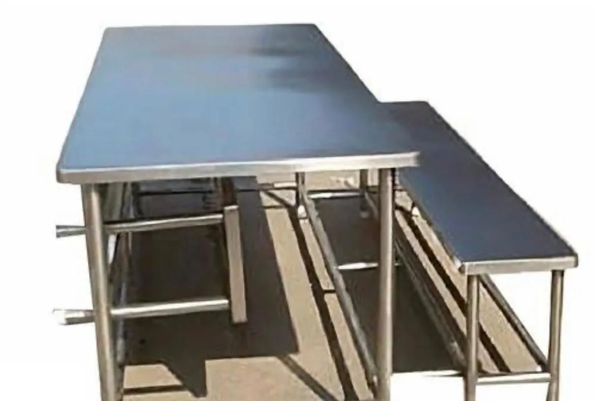 Stainless steel work table with matching bench